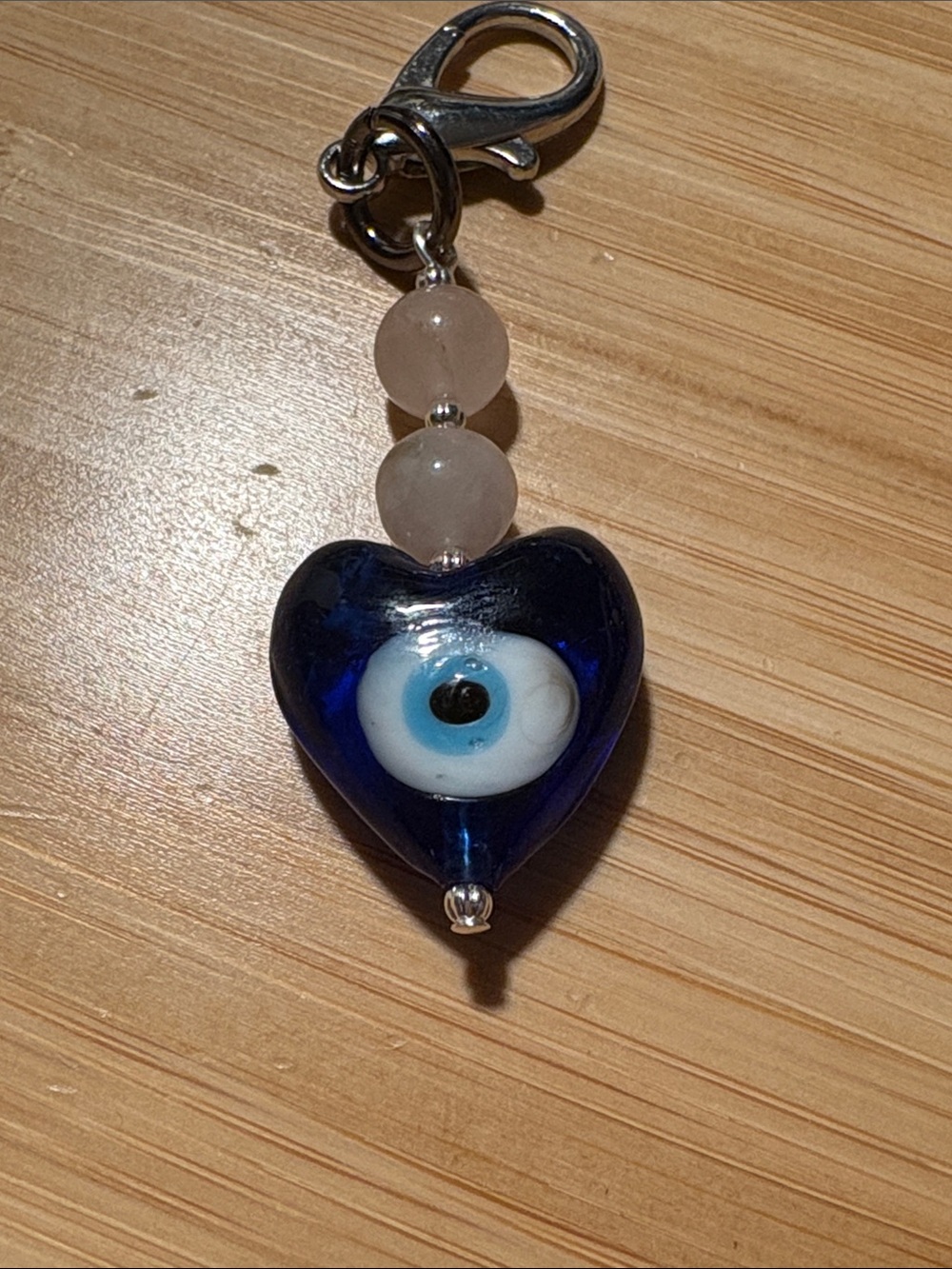 Handcrafted Rose Quartz Evil Eye Heart Glass Charm - Picture 6 of 6